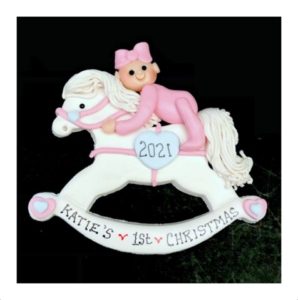 BABY GIRL ON ROCKING HORSE