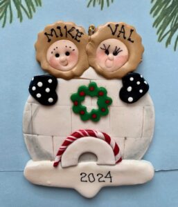 SNOW-COUPLE BY IGLOO....