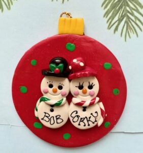 CUTE SNOW-COUPLE ON CHERRY RED POLKA DOT CHRISTMAS BALL
