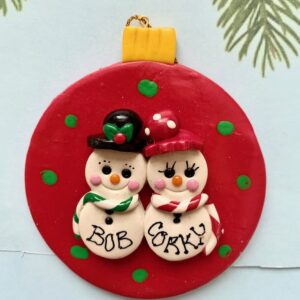 CUTE SNOW-COUPLE ON CHERRY RED POLKA DOT CHRISTMAS BALL